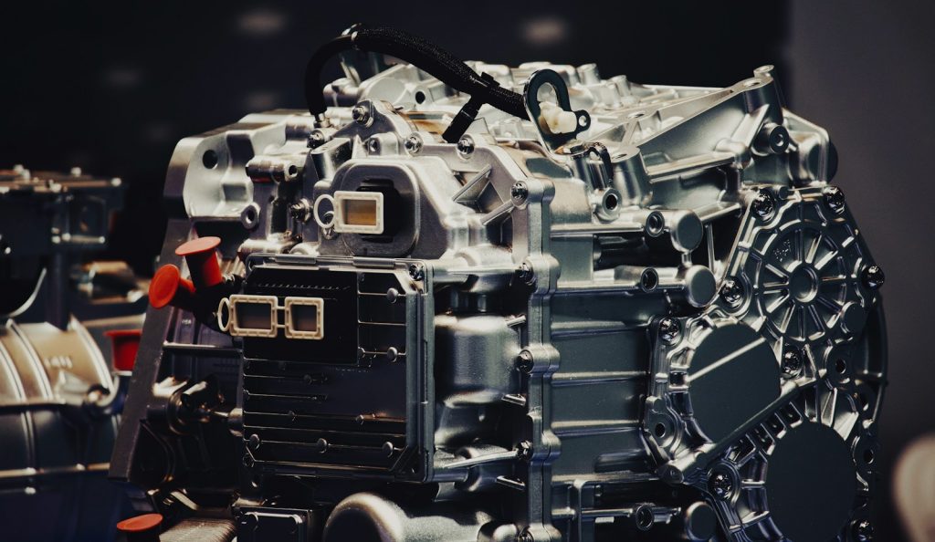 a close up of a car engine on a table